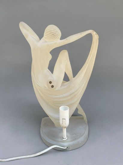 Pair of lucite lamps featuring a draped nude...