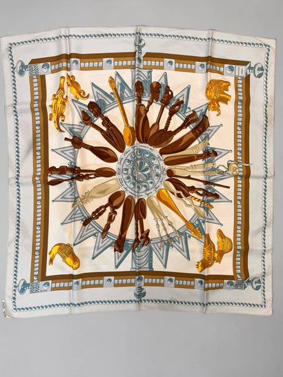 HERMÈS
Sky-blue printed silk square.
Signed...