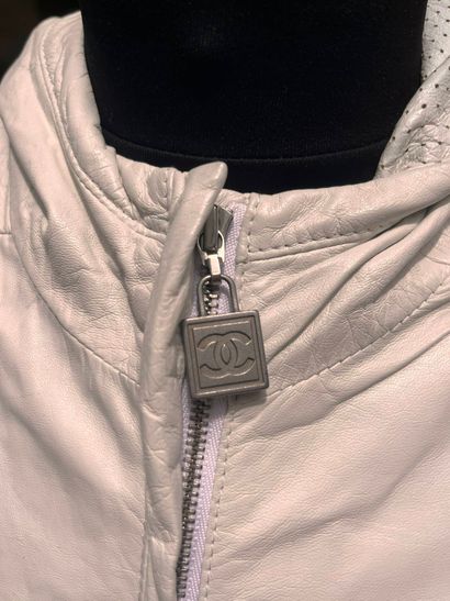 CHANEL
White leather jacket, monogram fabric...