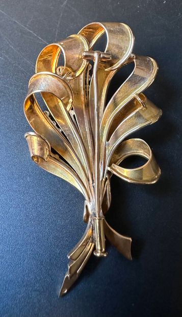 Spraying brooch in 750°/°° (18 k) yellow...