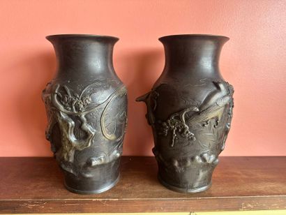 Pair of bronze vases with applied bird design
Mark...