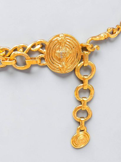 YVES SAINT LAURENT
Gold-plated metal belt...