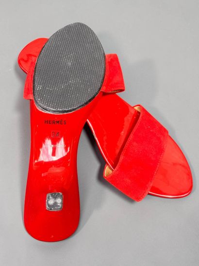 HERMÈS
Pair of lacquered wood and red suede...