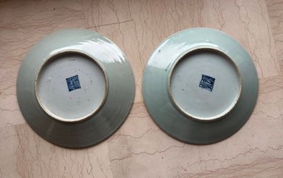 Pair of polychrome porcelain plates on a...