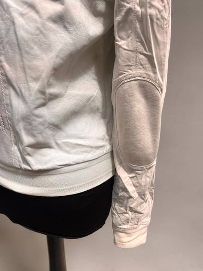 CHANEL
White leather jacket, monogram fabric...