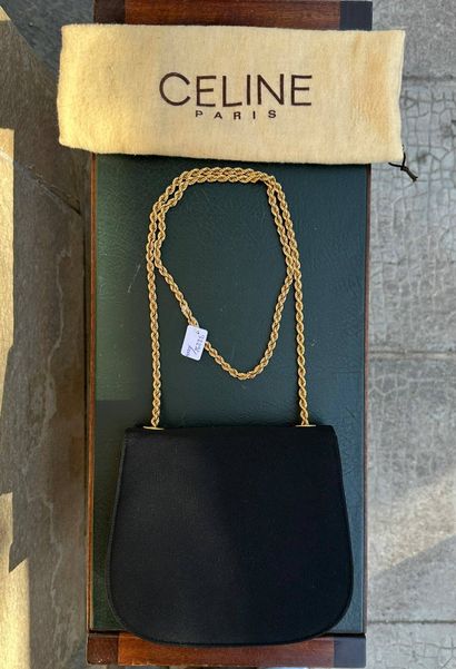 CELINE Paris
Evening handbag with flap.
Clasp...