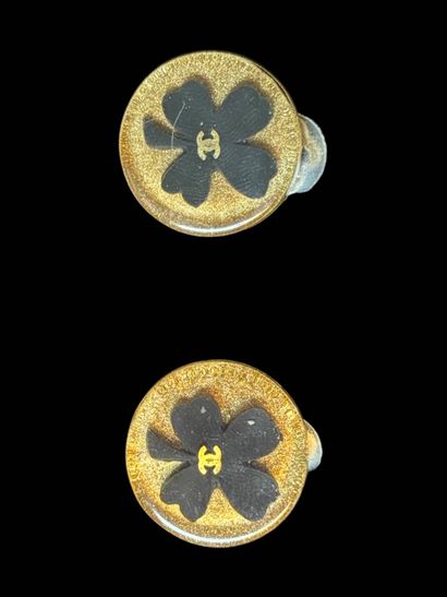 CHANEL
Pair of clip earrings in resin with...