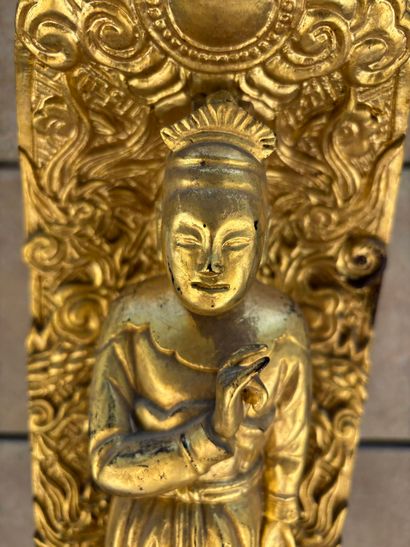 Asian divinity in carved and gilded wood
Height:...
