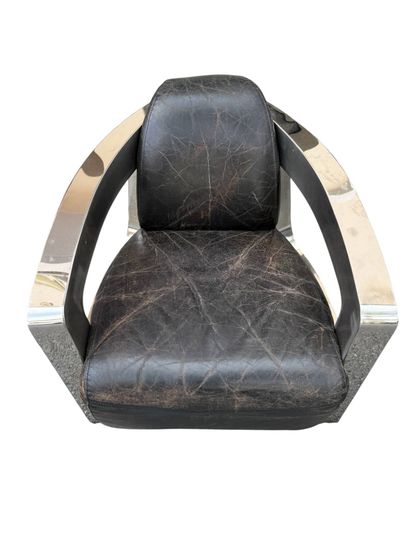 Contemporary work 
Armchair with polished...