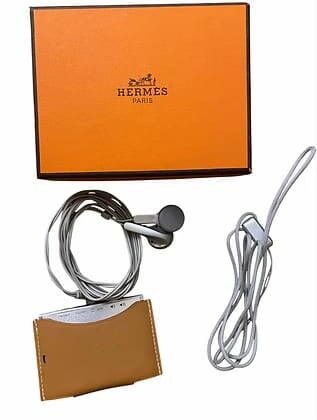HERMÈS 
Portable radio in Swift Gold leather...