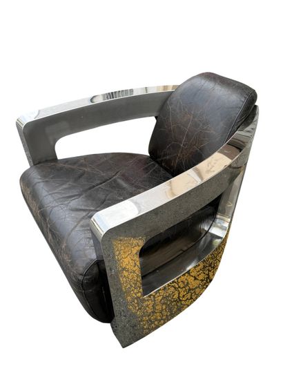Contemporary work 
Armchair with polished...