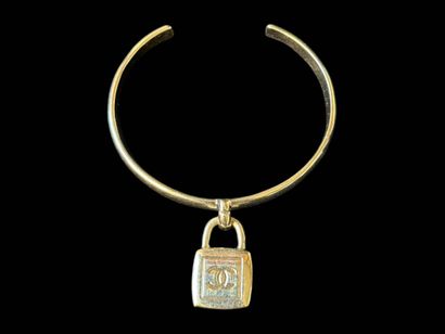 CHANEL
Rigid bangle in silver-plated metal,...