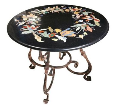 Pedestal table with iron and brass
brass...