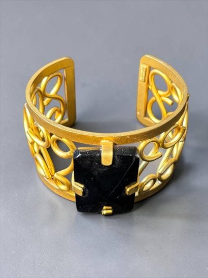 NINA RICCI
Rigid cuff bracelet in gilded...