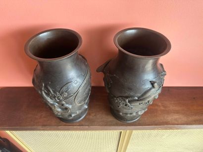 Pair of bronze vases with applied bird design
Mark...