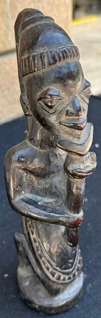 AFRICA - DAOUME
Carved wooden statuette depicting...