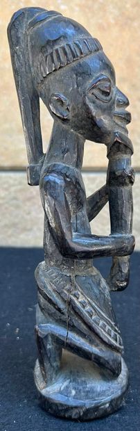 AFRICA - DAOUME
Carved wooden statuette depicting...