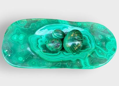 AFRICA, Zaire
Freestyle bowl and three malachite...