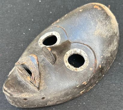 AFRICA, IVORY COAST - DAN
Carved wooden mask...