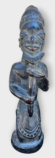 AFRICA - DAOUME
Carved wooden statuette depicting...