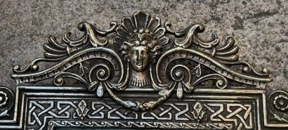 Miroir en bronze argenté à décor de mascaron...