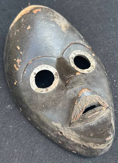AFRICA, IVORY COAST - DAN
Carved wooden mask...