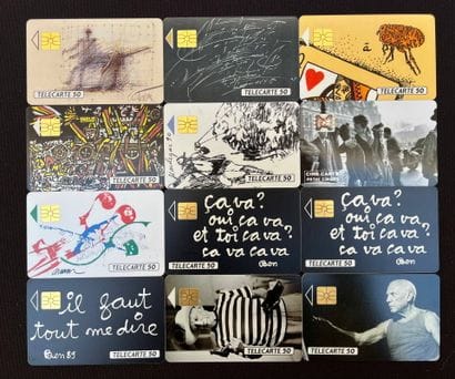 Lot consisting of 12 phone cards signed by...
