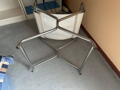 Chair made of chrome-plated tubing and white...