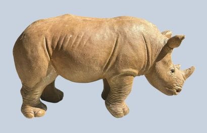 Resin or fiberglass rhinoceros with a patina...