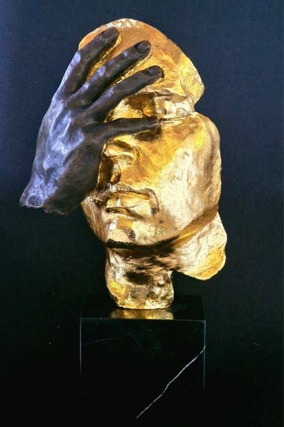 Regret
Bronze sculpture with a brown and...