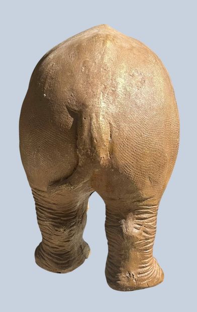 Resin or fiberglass rhinoceros with a patina...