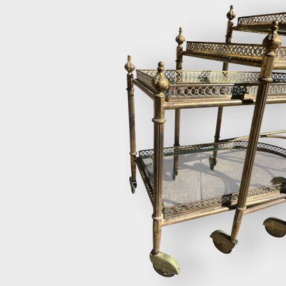 JANSEN
Three nesting side tables in brass...