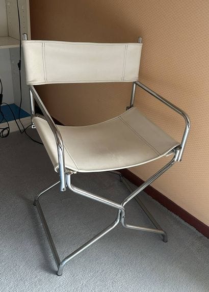 Chair made of chrome-plated tubing and white...