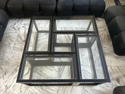 Set of nesting coffee tables that fit inside...