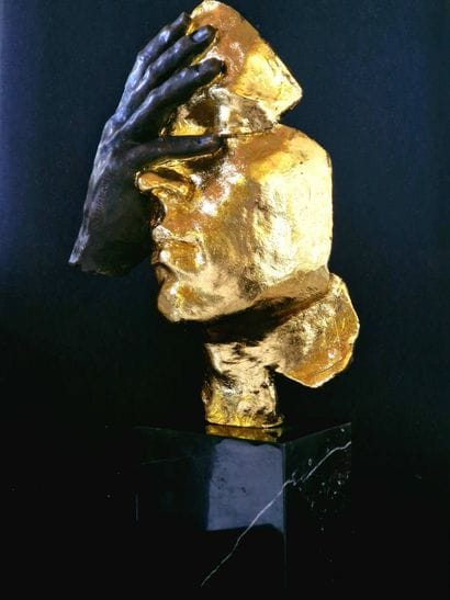 Regret
Bronze sculpture with a brown and...