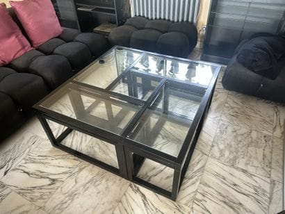 Set of nesting coffee tables that fit inside...
