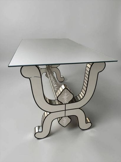 Mirrored coffee table in the style of Serge...