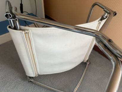 Chair made of chrome-plated tubing and white...