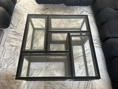 Set of nesting coffee tables that fit inside...