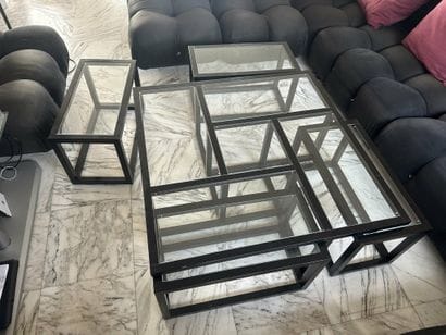 Set of nesting coffee tables that fit inside...
