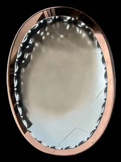 Miroir ovale à contour biseauté et cadre...