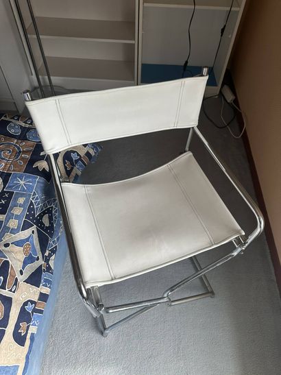 Chair made of chrome-plated tubing and white...
