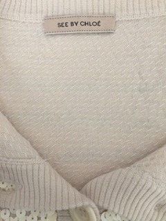 CHLOE

Cardigan crème entièrement pailletée...