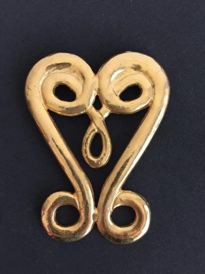 ROCHAS

Broche «  volute «  en métal doré...