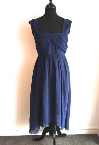 CARVEN

Robe en bretelles en coton bleu

Taille:...