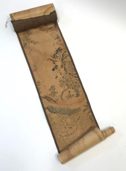 Un grand rouleau peint sur soie à décor de...