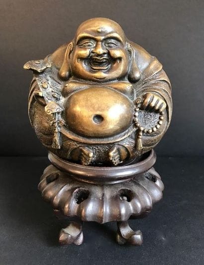 Sujet en bronze figurant un bouddha

Chine,...