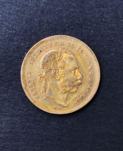 1 pièce de 20 francs ou 8 forints François...