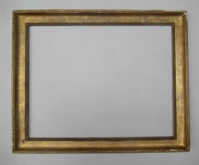 Cadre en bois et pâte doré dit 