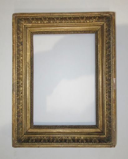 Cadre en bois et pâte bronziné dit 